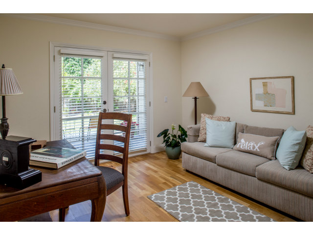 1011 Vaquero Road Pebble Beach, CA 93953 - Photo 8 of 25 a living room with furniture and a window