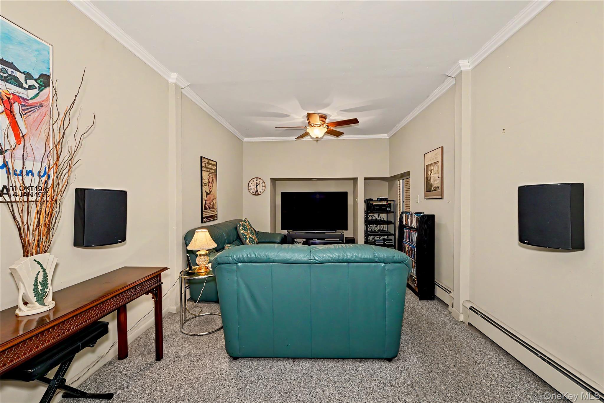631 Croton Falls Road Carmel, NY 10512 - Photo 20 of 43 a living room with furniture and a flat screen tv