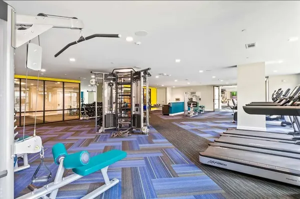 a view of a living room and entryway