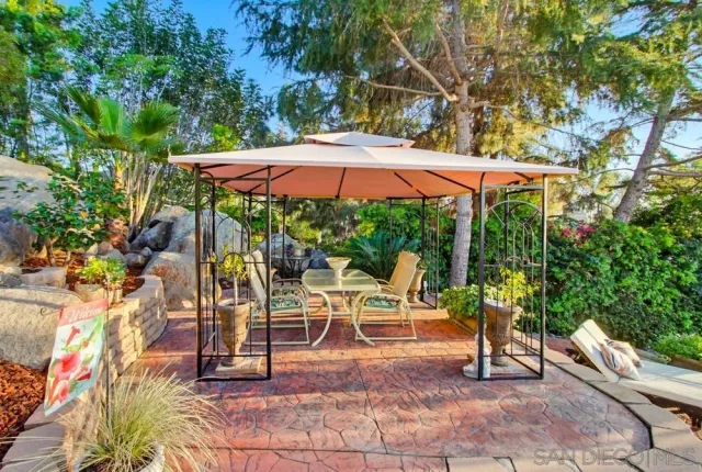 a view of outdoor space yard deck patio and outdoor kitchen