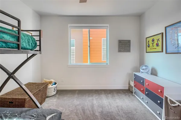 a room with a bed and a window