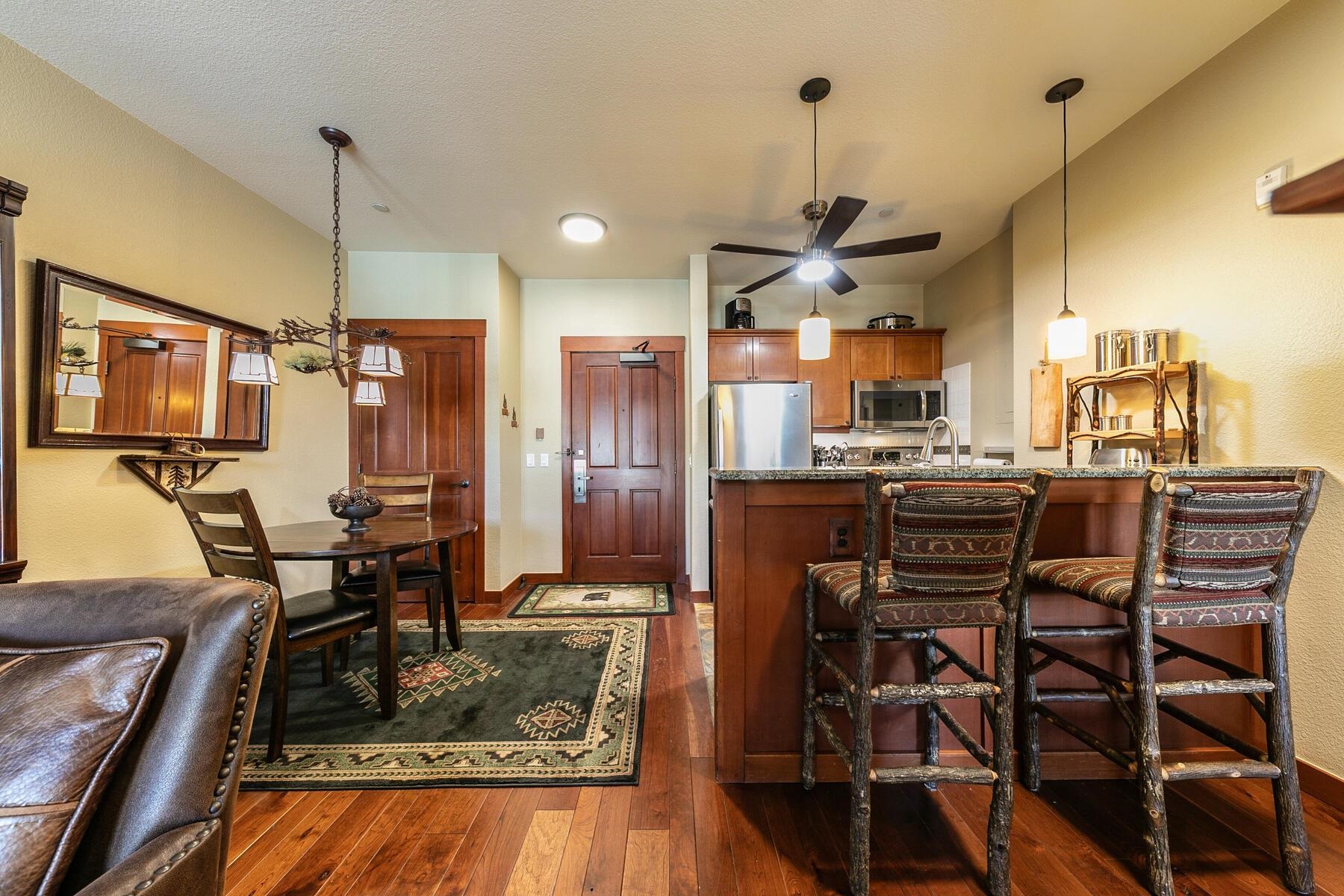 1880 Village South Road, Unit 3334 Olympic Valley, CA 96146 - Photo 11 of 27 a view of a dining room with furniture window and wooden floor
