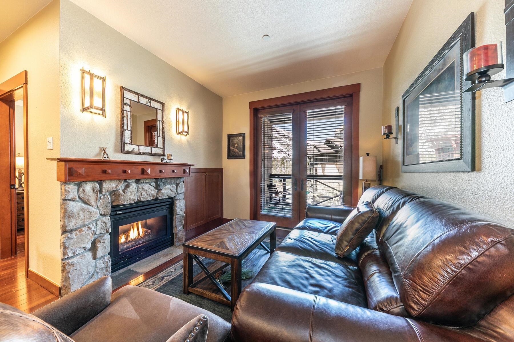 1880 Village South Road, Unit 3334 Olympic Valley, CA 96146 - Photo 14 of 27 a living room with furniture and a fireplace