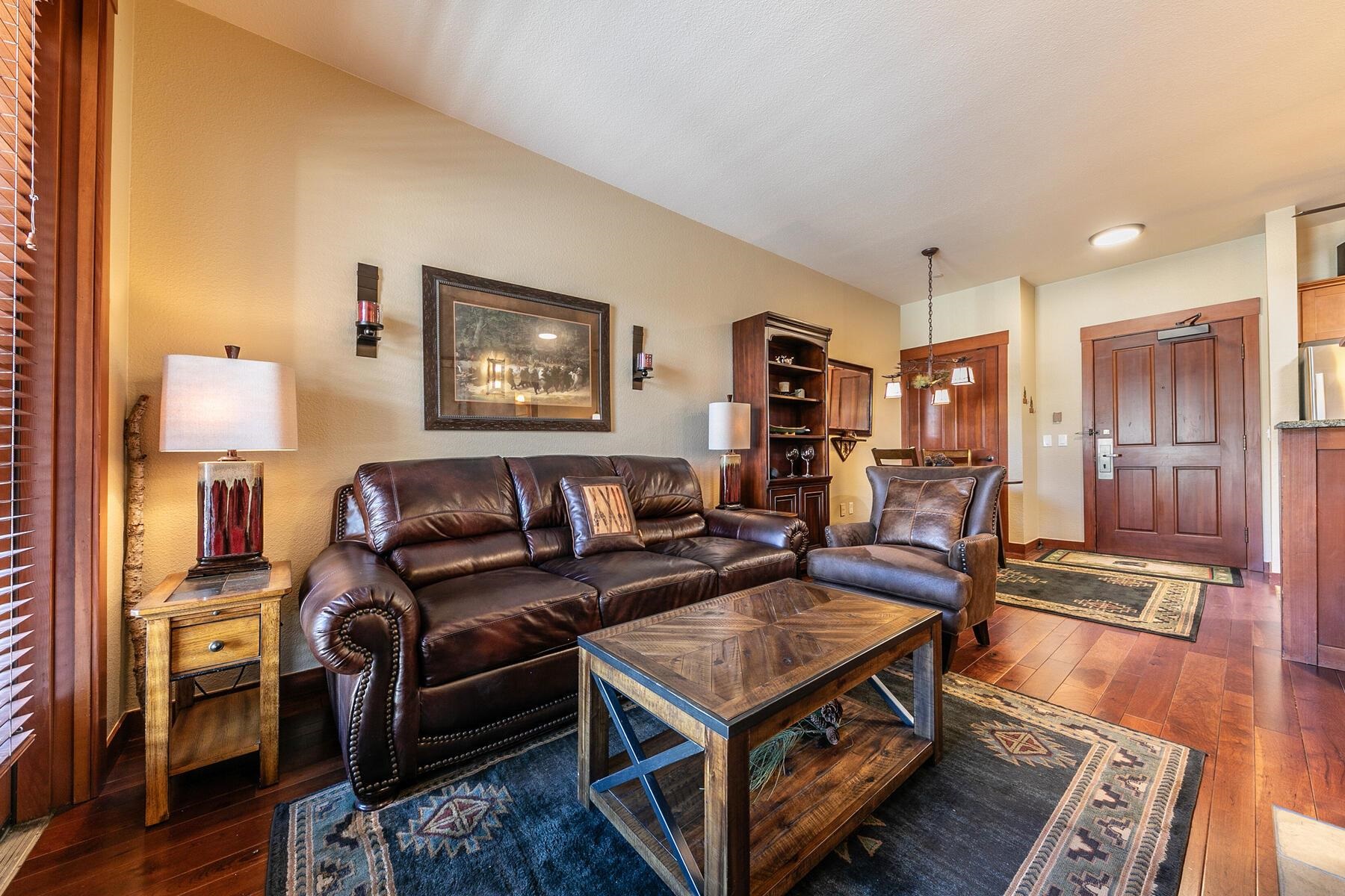 1880 Village South Road, Unit 3334 Olympic Valley, CA 96146 - Photo 15 of 27 a living room with furniture and a lamp