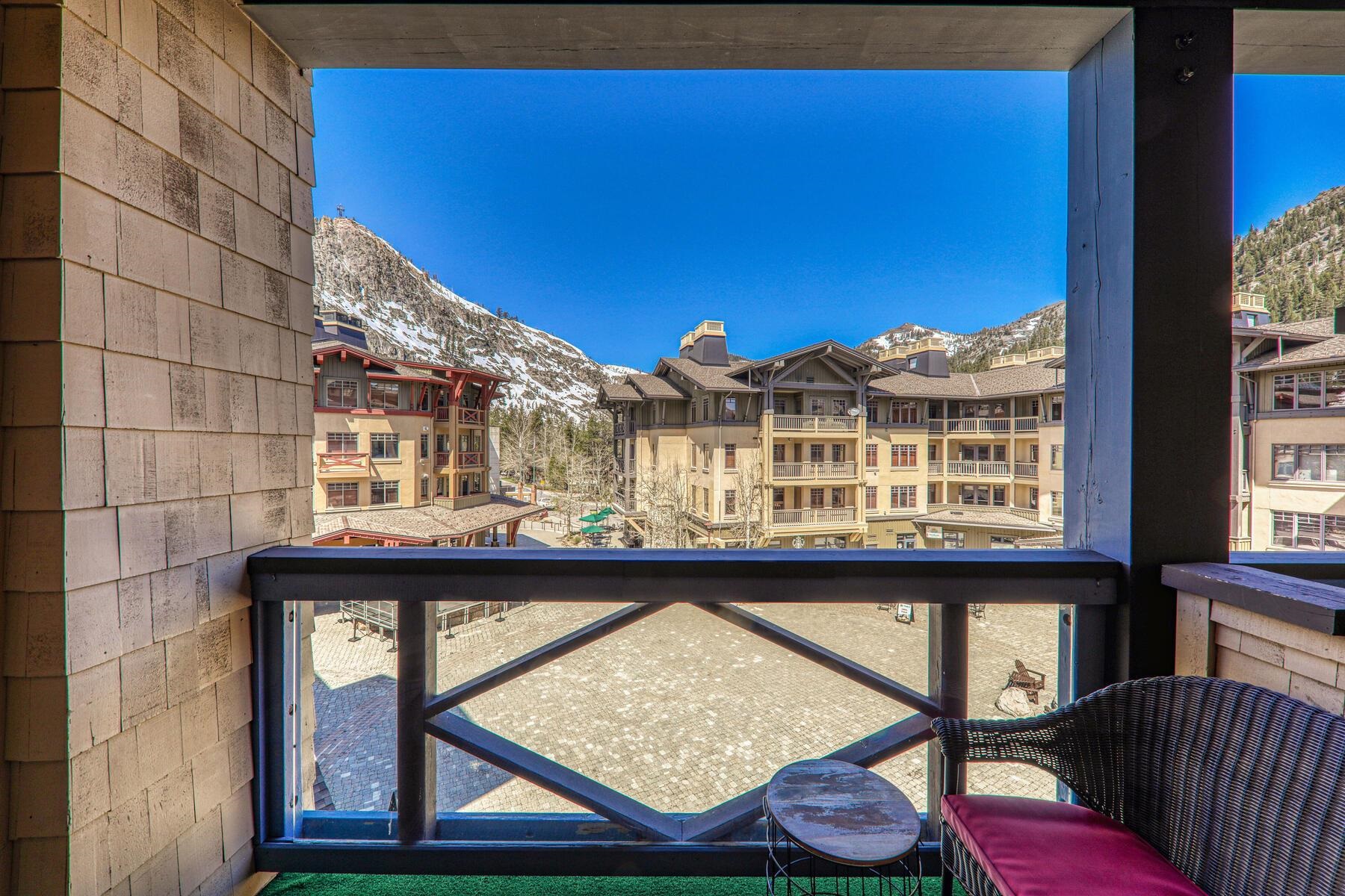 1880 Village South Road, Unit 3334 Olympic Valley, CA 96146 - Photo 2 of 27 a view of a balcony with chairs and wooden floor