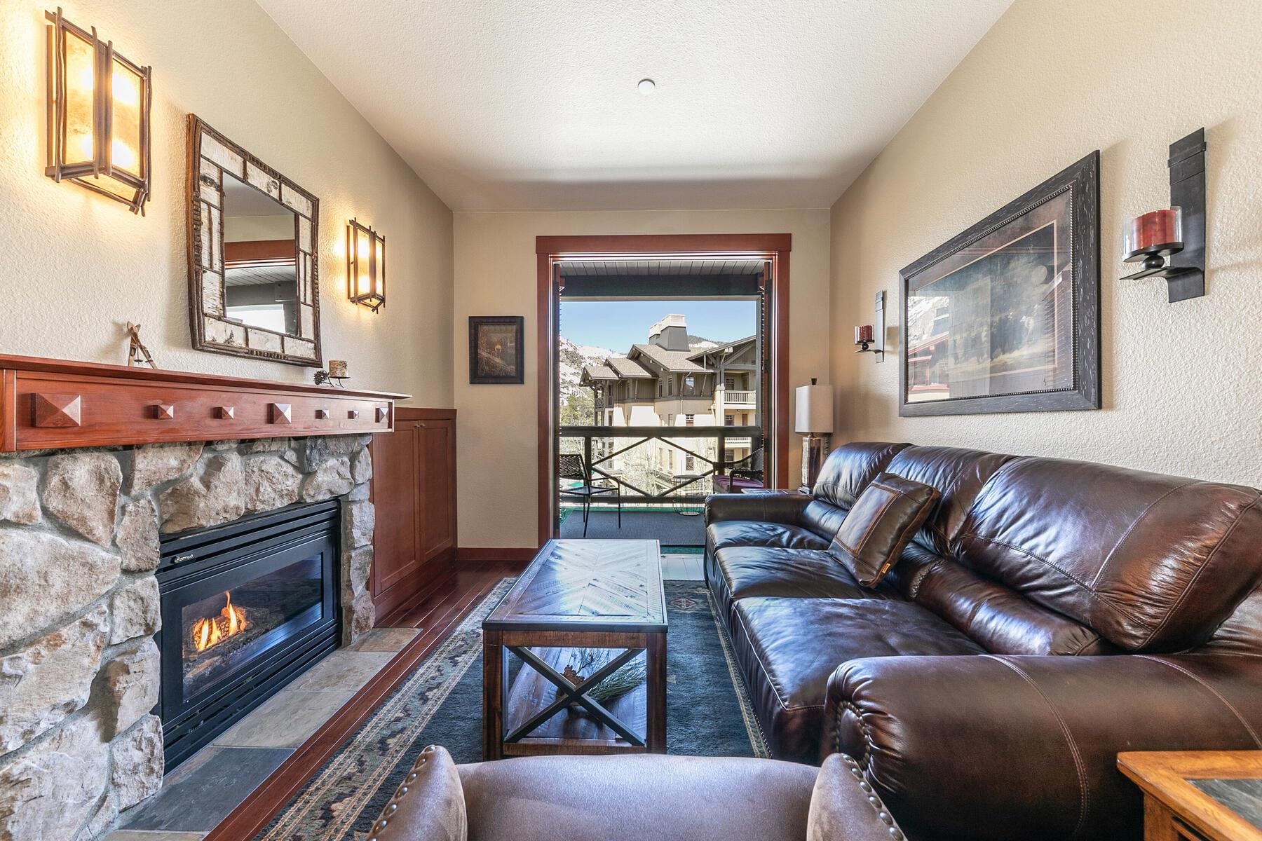 1880 Village South Road, Unit 3334 Olympic Valley, CA 96146 - Photo 6 of 27 a living room with furniture and a fireplace