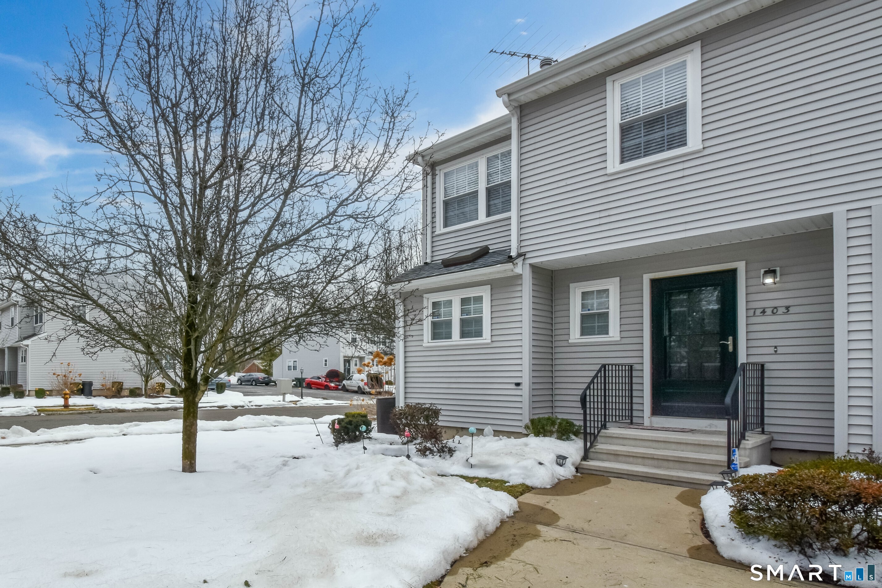 1403 Old Town Road, Unit 1403 Bridgeport, CT 06606 - Photo 15 of 25 a view of a house with a yard