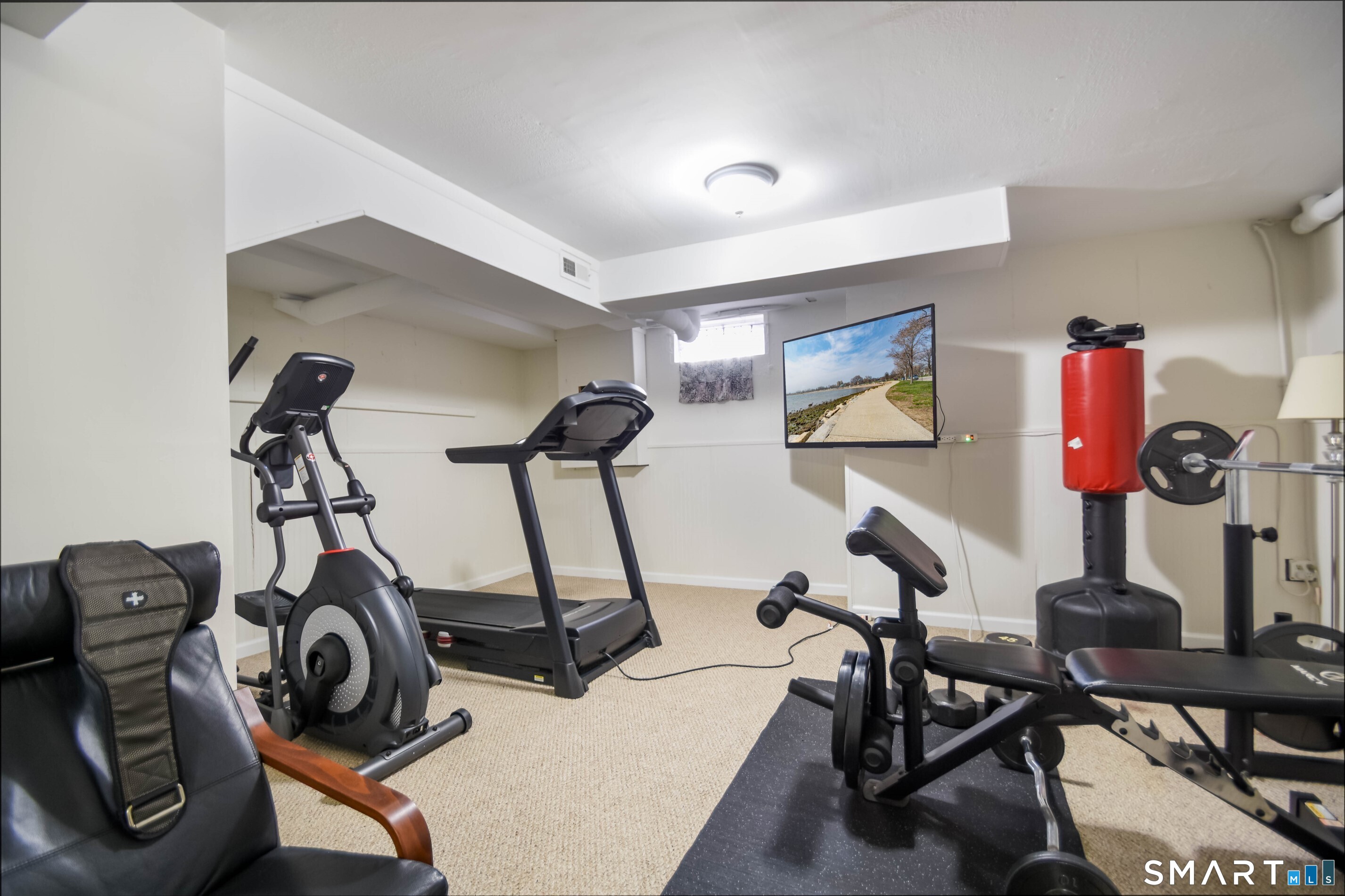 1403 Old Town Road, Unit 1403 Bridgeport, CT 06606 - Photo 23 of 25 a view of a room with gym equipment