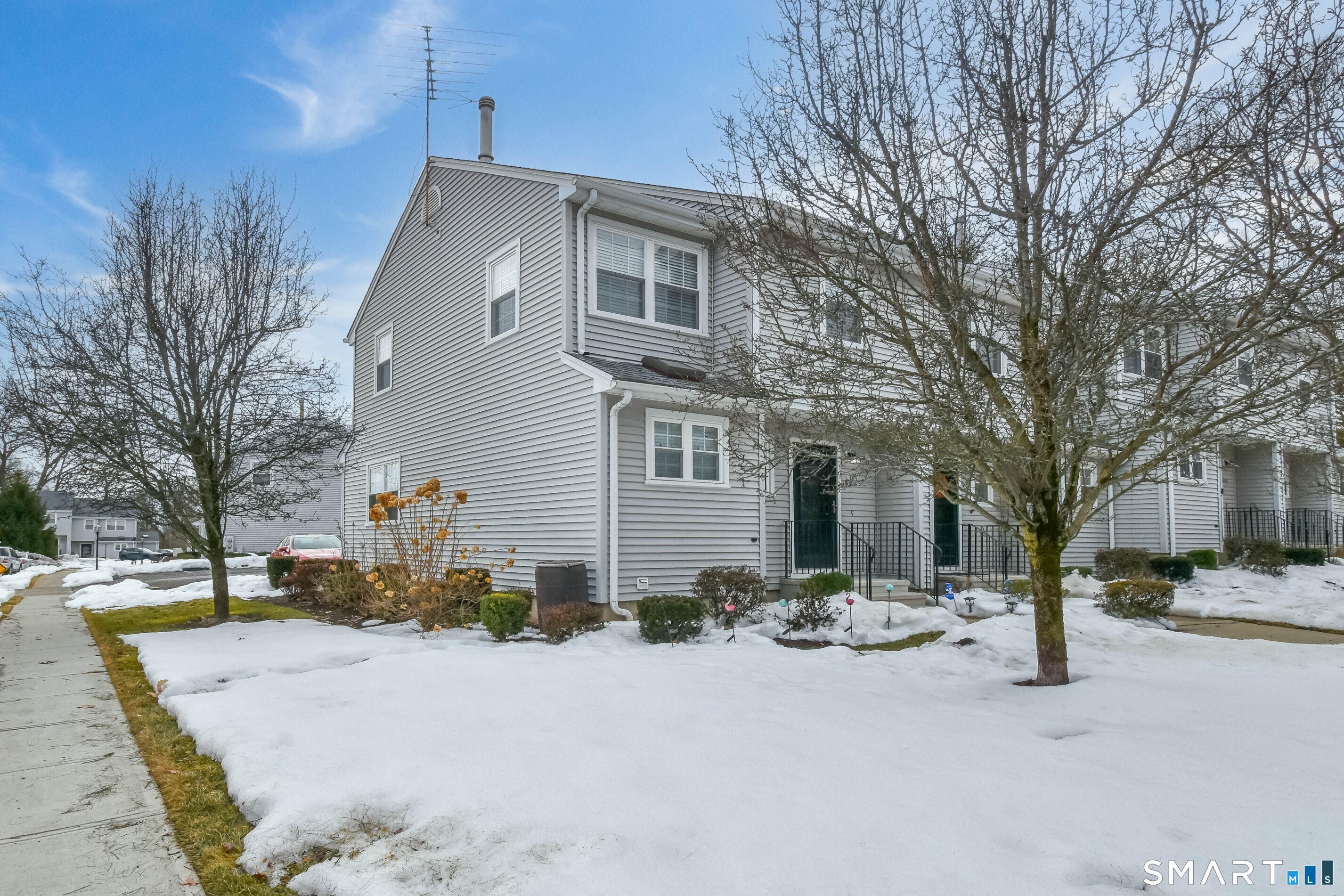 1403 Old Town Road, Unit 1403 Bridgeport, CT 06606 - Photo 25 of 25 a front view of a house with a yard
