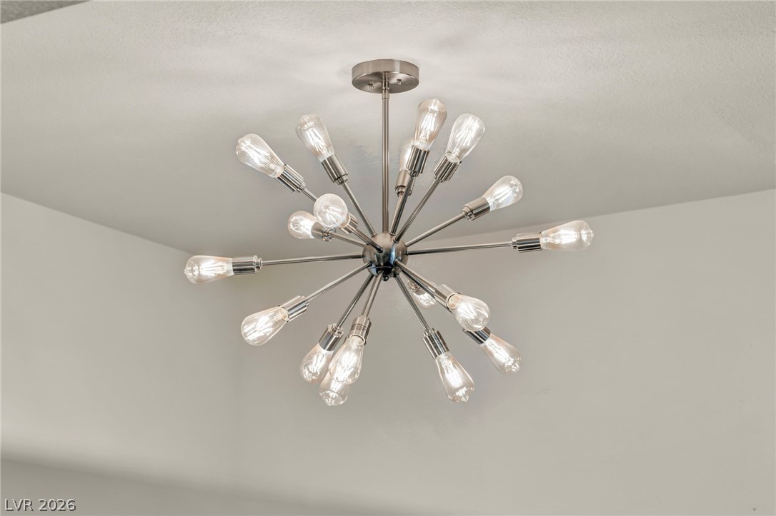 8070 West Russell Road, Unit 2060 Las Vegas, NV 89113 - Photo 25 of 47 This modern light fixture creates a striking focal point in any room.