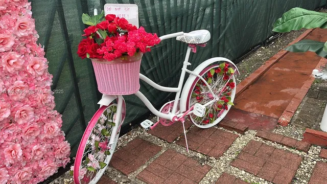 a view of a house with a wooden deck