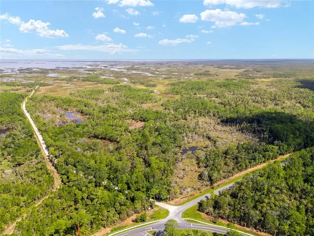 a view of an ocean and mountain