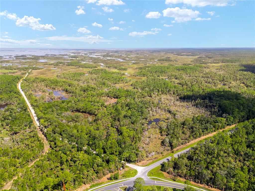 0 Southeast 193rd Place Yankeetown, FL 34498 - Photo 3 of 31 a view of an ocean and mountain