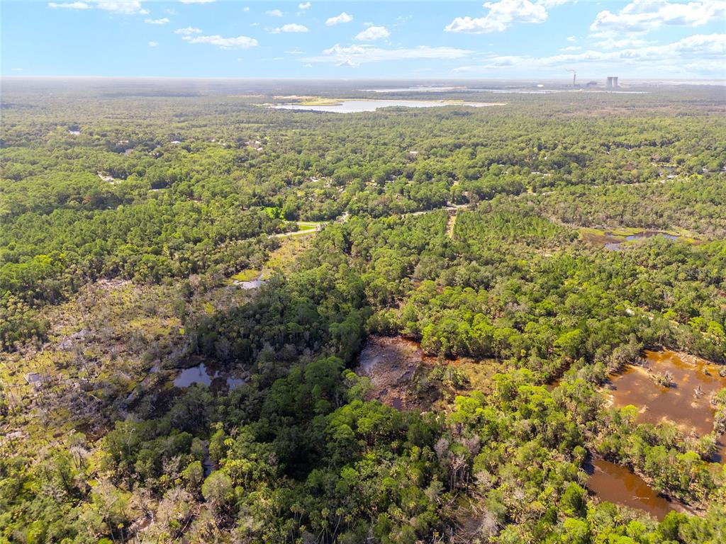 0 Southeast 193rd Place Yankeetown, FL 34498 - Photo 10 of 31 a view of a city with green field
