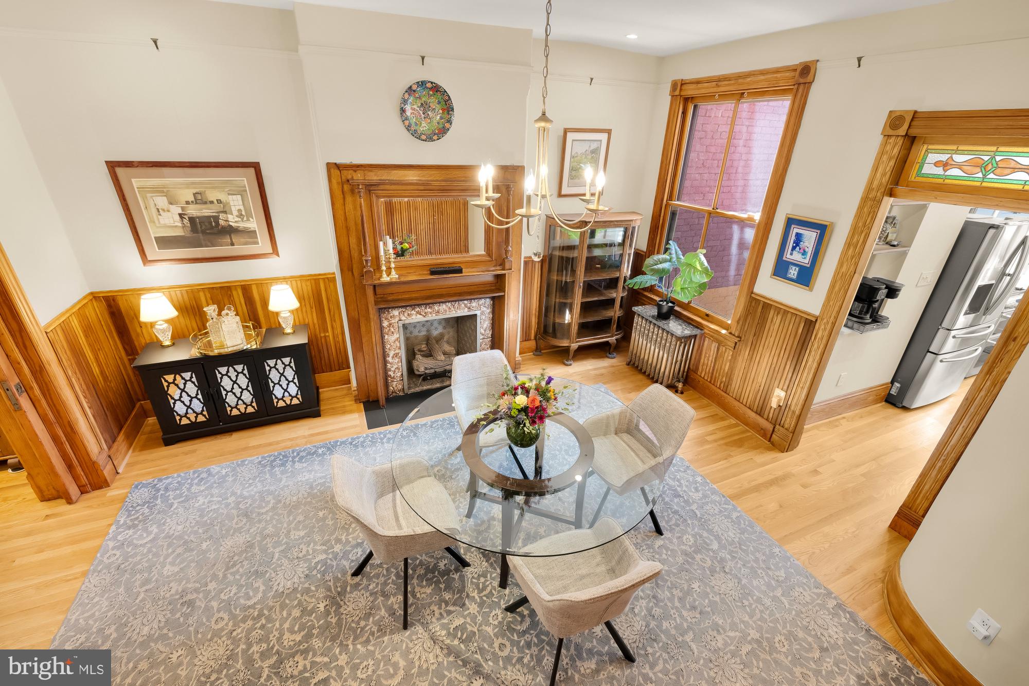 1214 T Street Northwest Washington, DC 20009 - Photo 23 of 88 a living room with fireplace furniture and a flat screen tv
