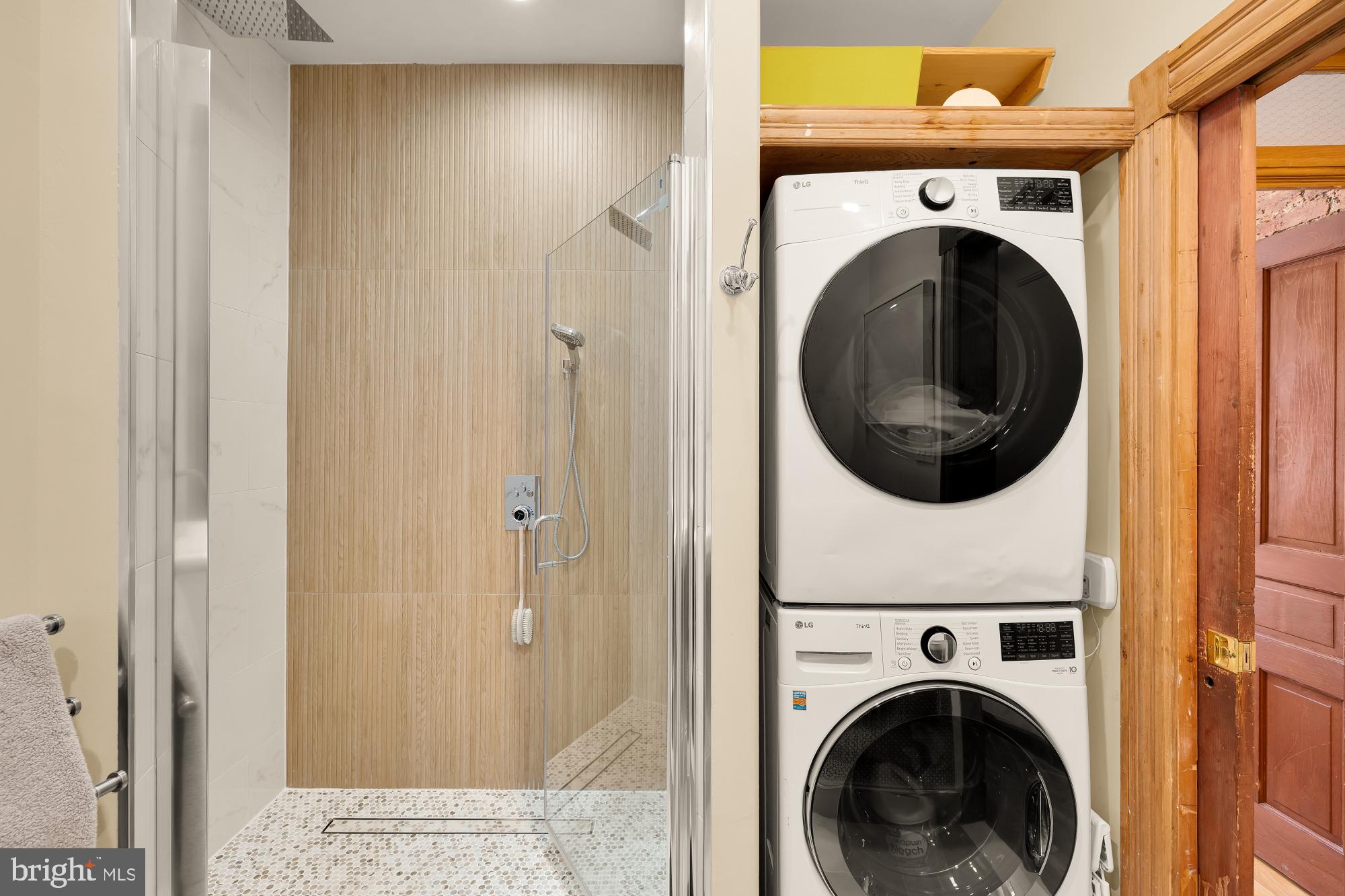 1214 T Street Northwest Washington, DC 20009 - Photo 37 of 88 a view of a hallway with washer and dryer