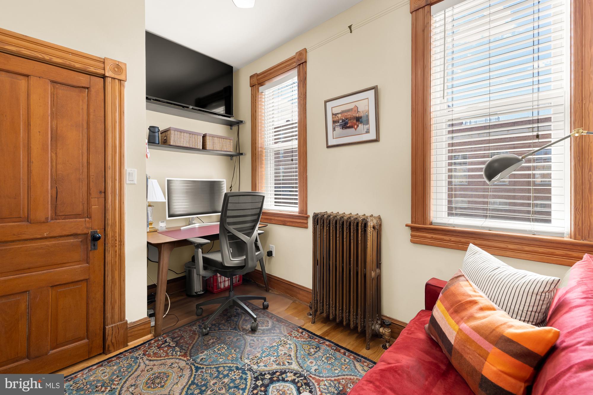 1214 T Street Northwest Washington, DC 20009 - Photo 38 of 88 a view of a livingroom with workspace and a window