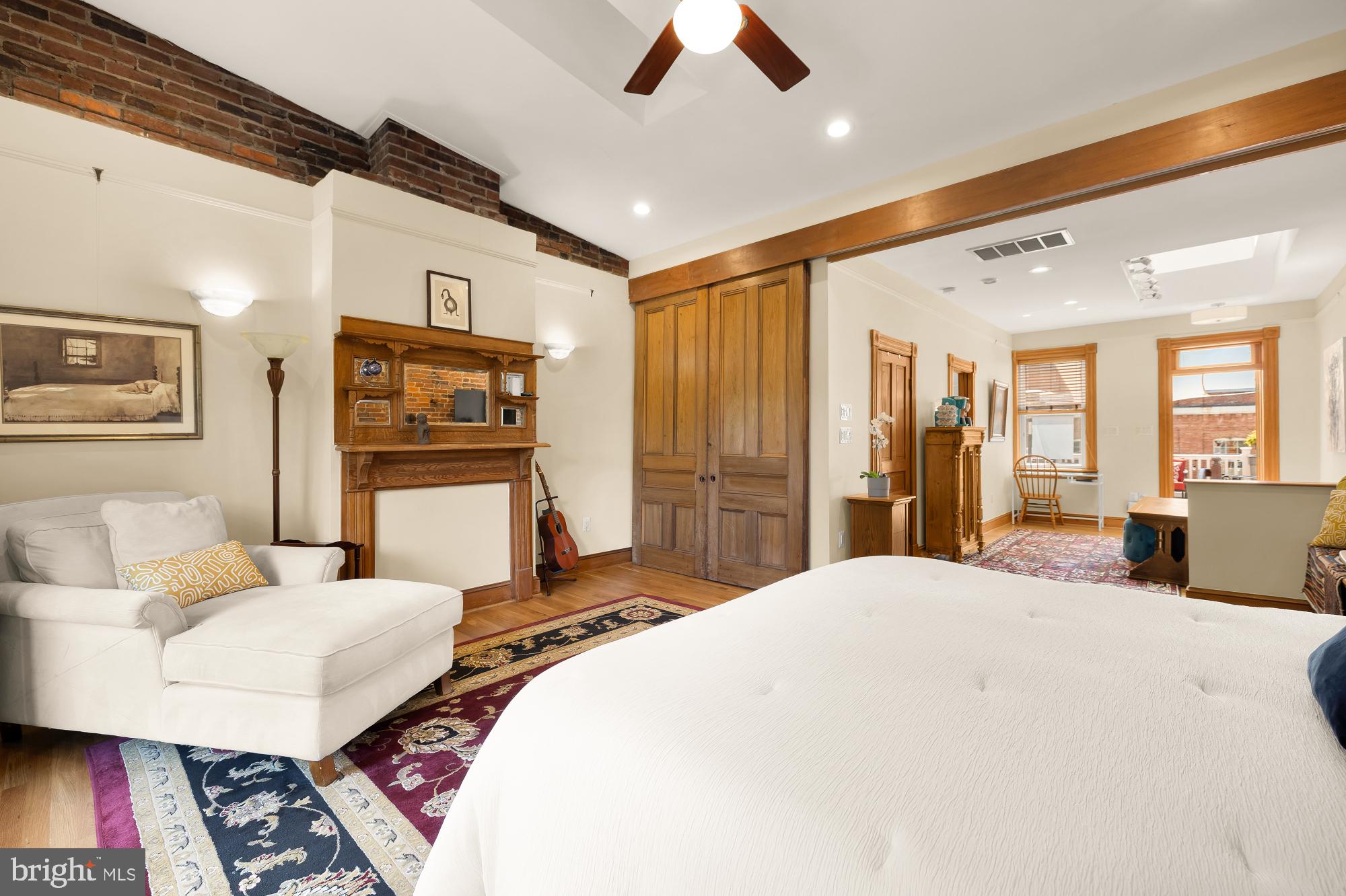 1214 T Street Northwest Washington, DC 20009 - Photo 46 of 88 a bed room with a bed window and a television