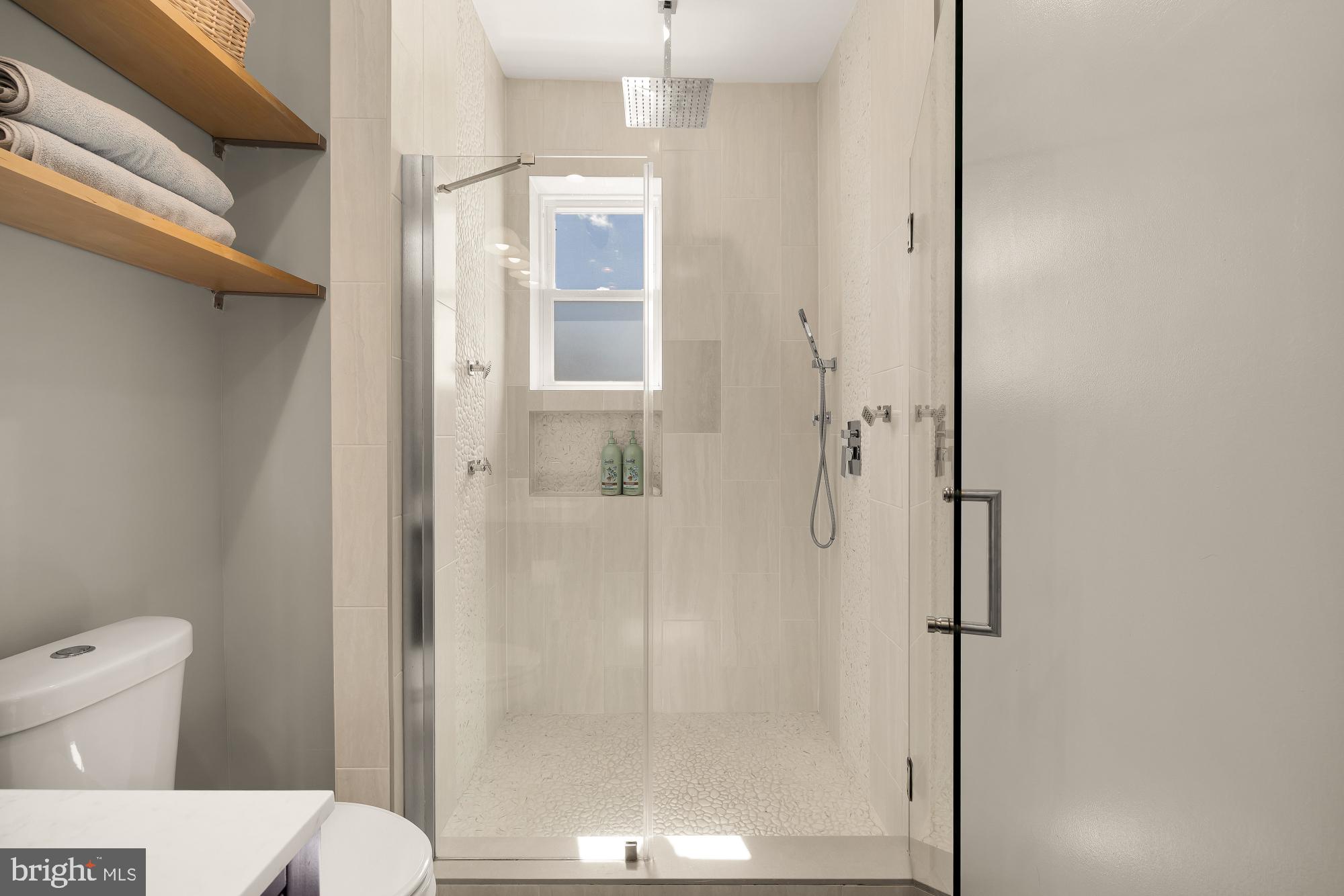 1214 T Street Northwest Washington, DC 20009 - Photo 51 of 88 a bathroom with a shower and a toilet