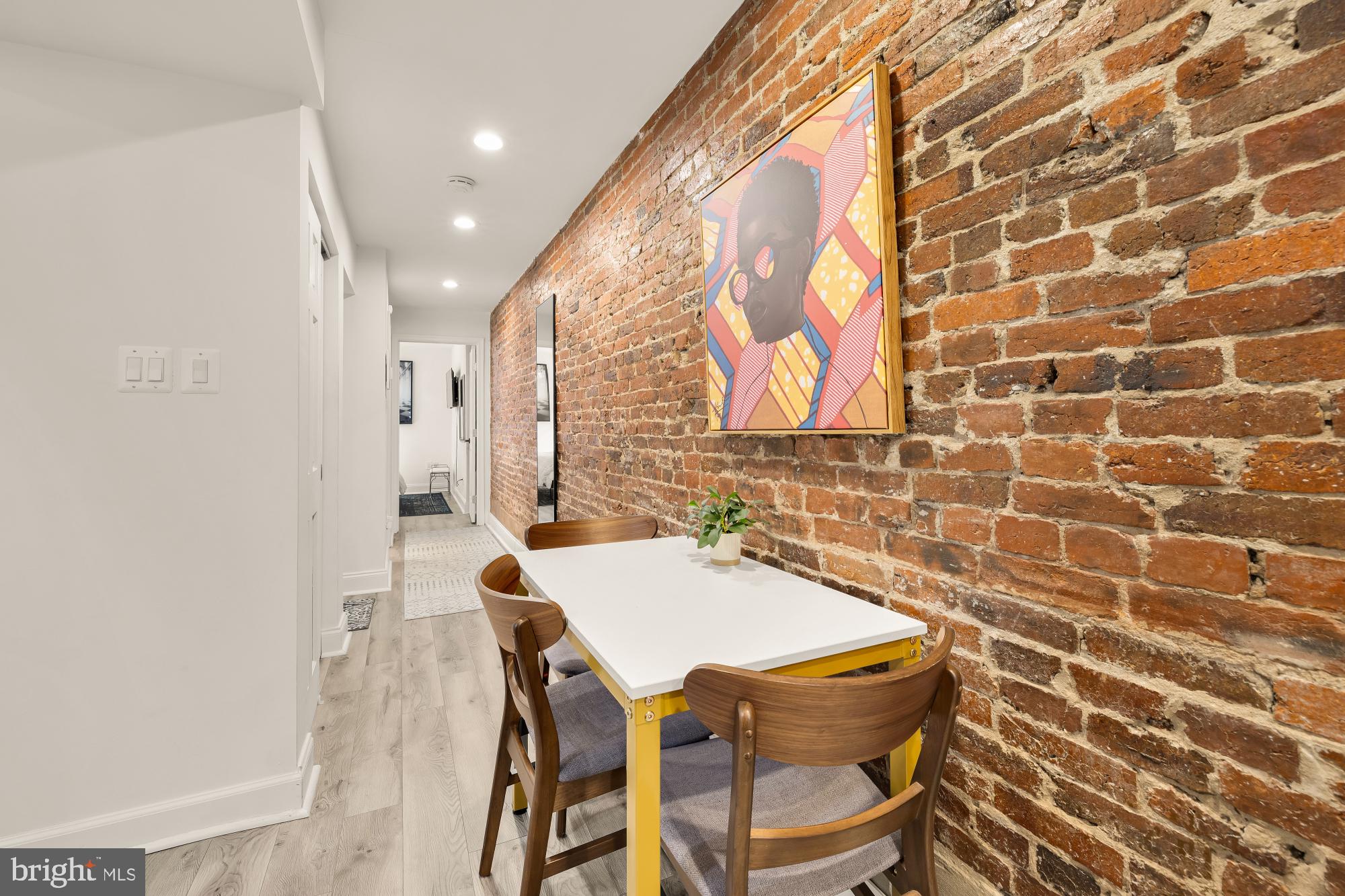 1214 T Street Northwest Washington, DC 20009 - Photo 66 of 88 a dining room with a sink and a mirror