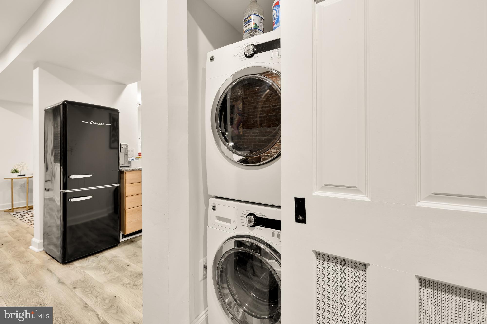 1214 T Street Northwest Washington, DC 20009 - Photo 67 of 88 a view of a hallway with washer and dryer