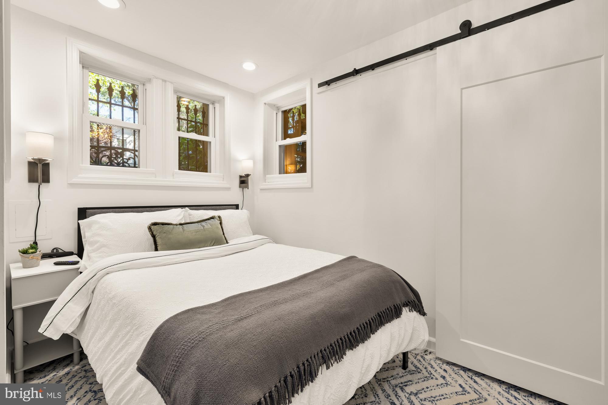 1214 T Street Northwest Washington, DC 20009 - Photo 68 of 88 a bedroom with a bed and a window