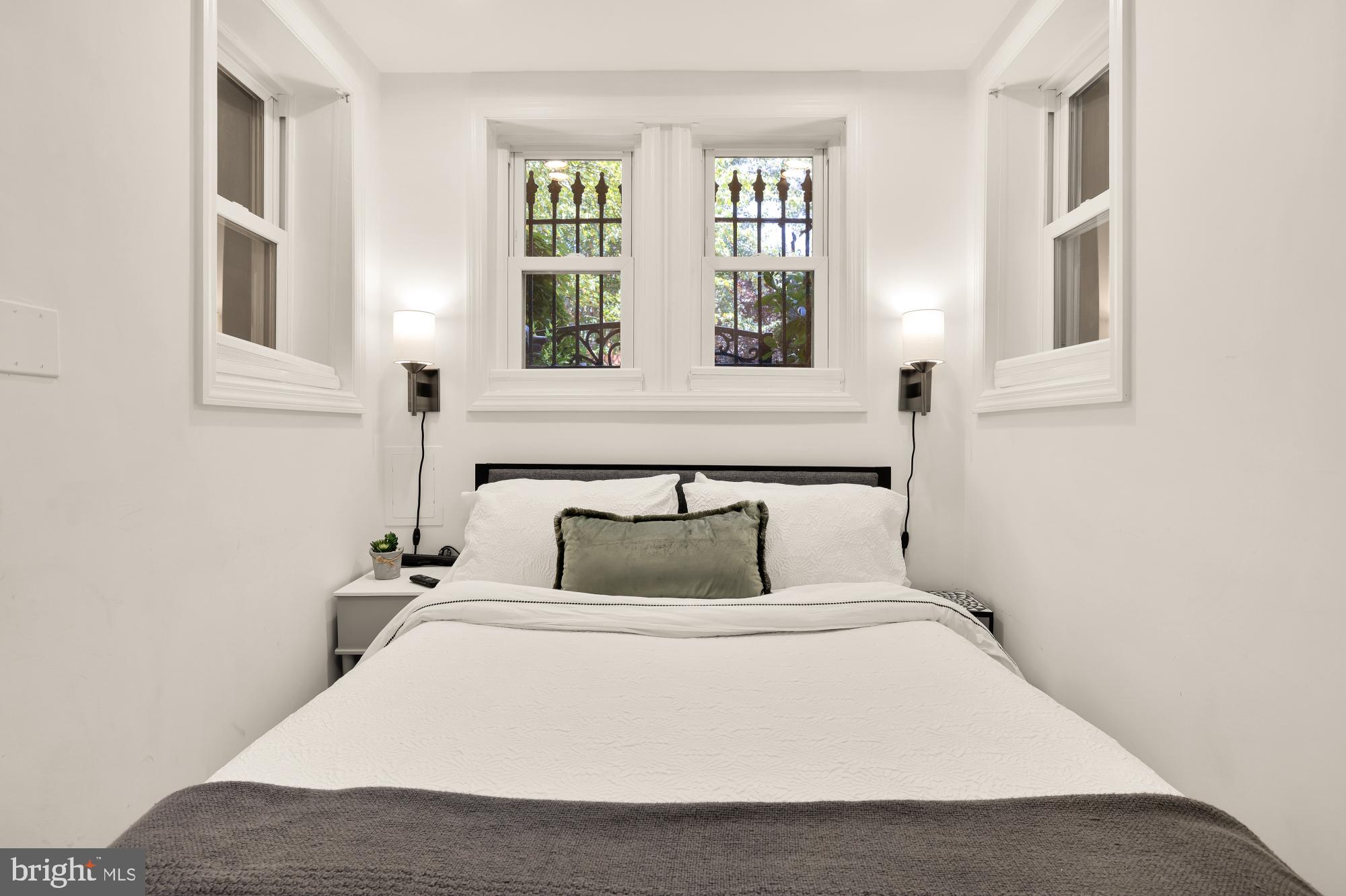 1214 T Street Northwest Washington, DC 20009 - Photo 69 of 88 a bedroom with a bed and a window