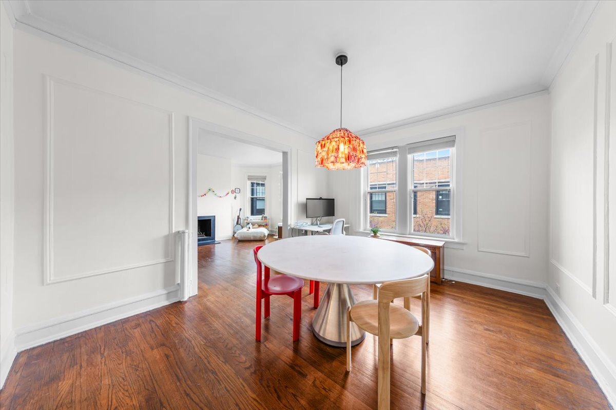 602 Sheridan Road, Unit 3E Evanston, IL 60202 - Photo 13 of 21 a view of a dining room with furniture window and wooden floor