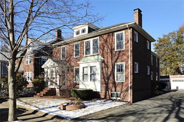 41 Pershing Road Boston, MA 02130 - Photo 1 of 8 a front view of a house with a yard