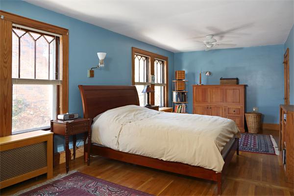 41 Pershing Road Boston, MA 02130 - Photo 4 of 8 a bedroom with a bed and window