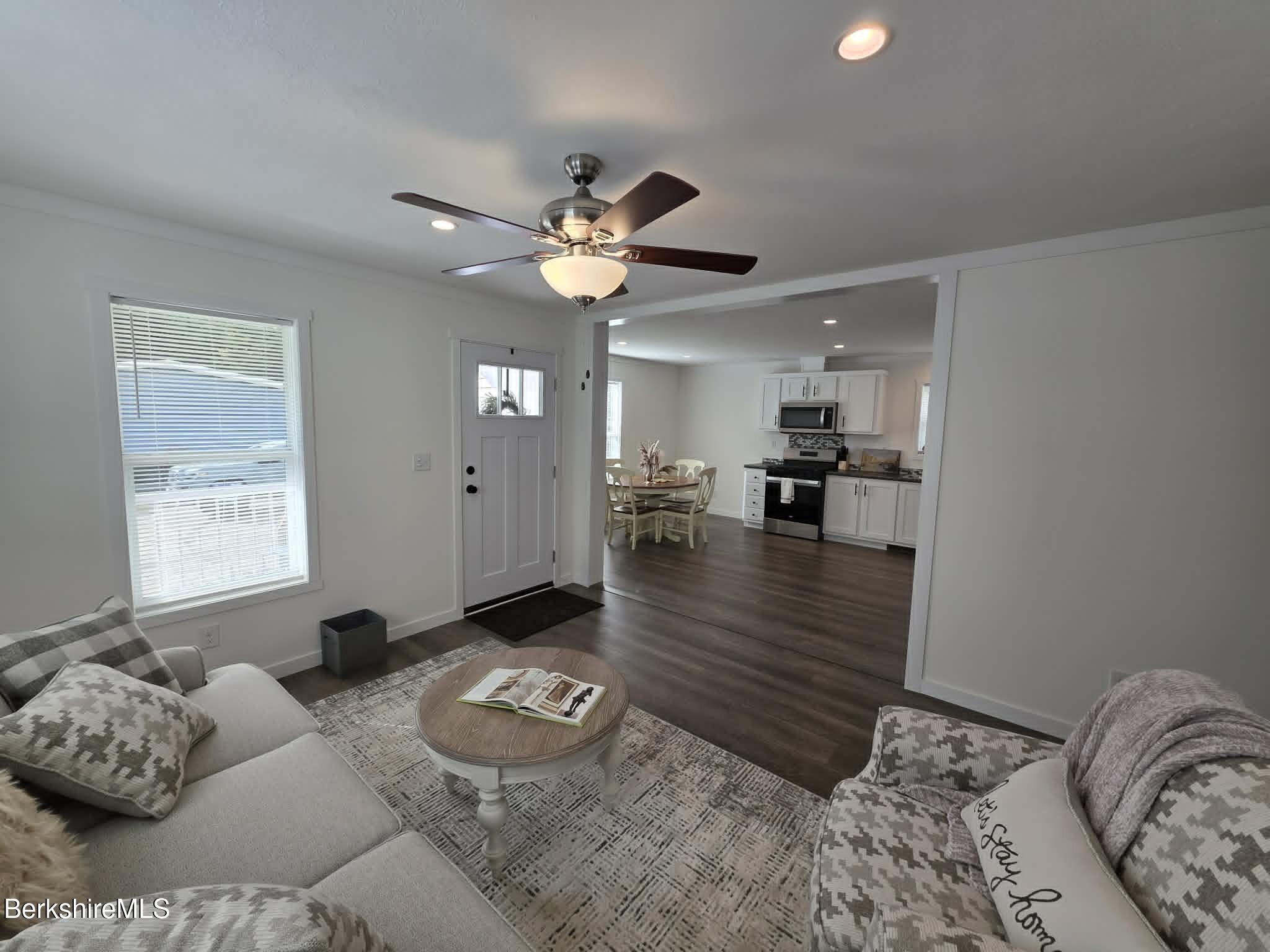 395 Cheshire Road, Unit 113 Pittsfield, MA 01201 - Photo 7 of 20 Living to Kitchen View