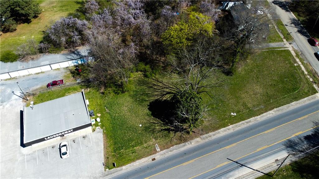 207 North River Street Calhoun, GA 30701 - Photo 2 of 23 an aerial view of a house with a yard