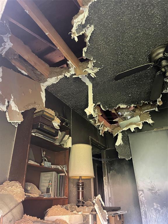 403 South 1st Street Sanger, TX 76266 - Photo 5 of 12 a bathroom with a sink mirror and vanity