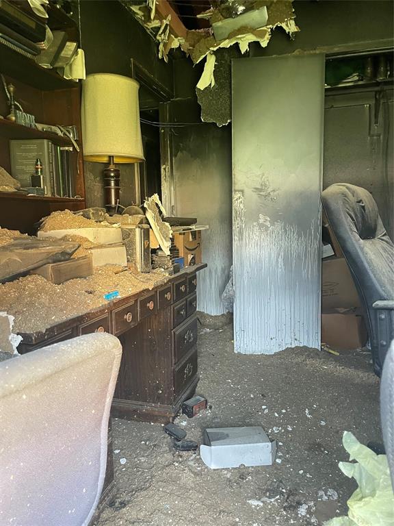 403 South 1st Street Sanger, TX 76266 - Photo 6 of 12 a bathroom with a sink a mirror and shower