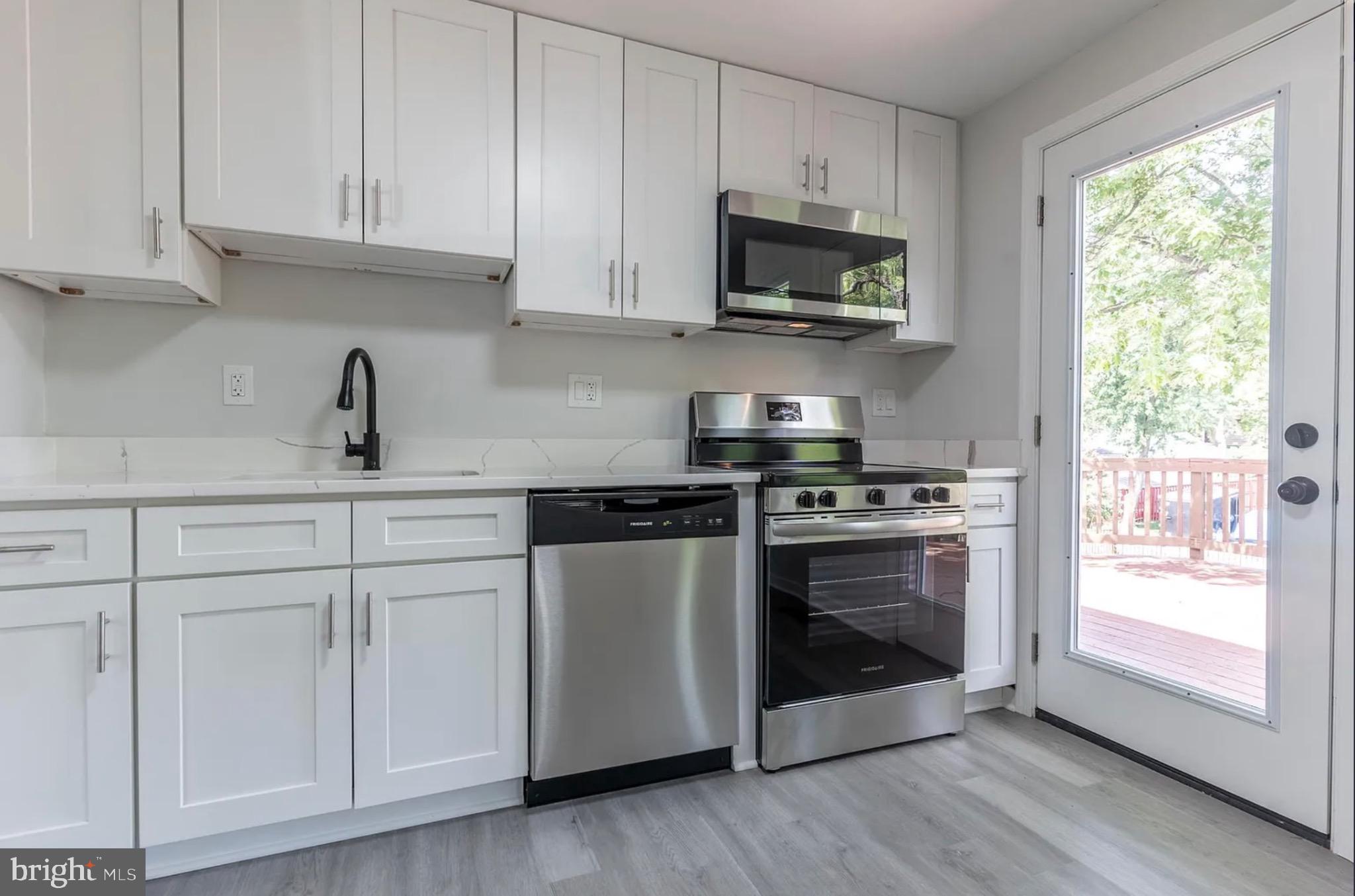 131 North Garfield Road Sterling, VA 20164 - Photo 11 of 13 Modern kitchen with sleek appliances.