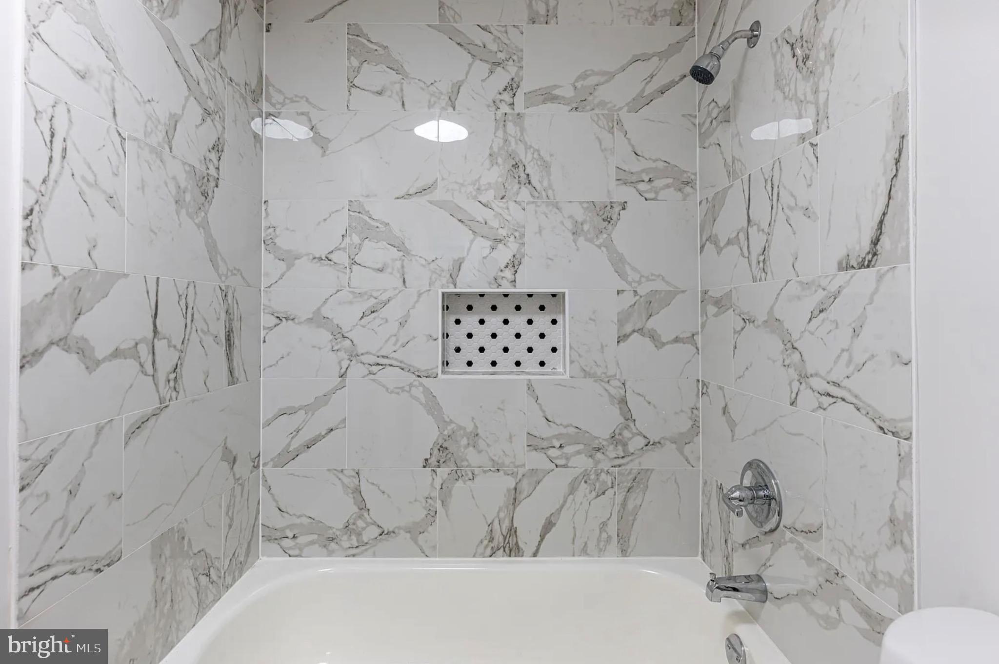 131 North Garfield Road Sterling, VA 20164 - Photo 6 of 13 Elegant marble shower retreat.