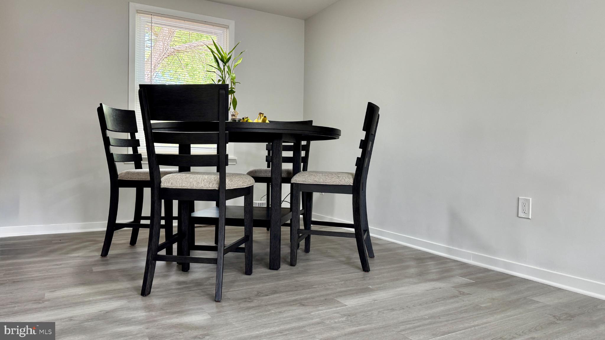 131 North Garfield Road Sterling, VA 20164 - Photo 8 of 13 Modern dining space with natural light.