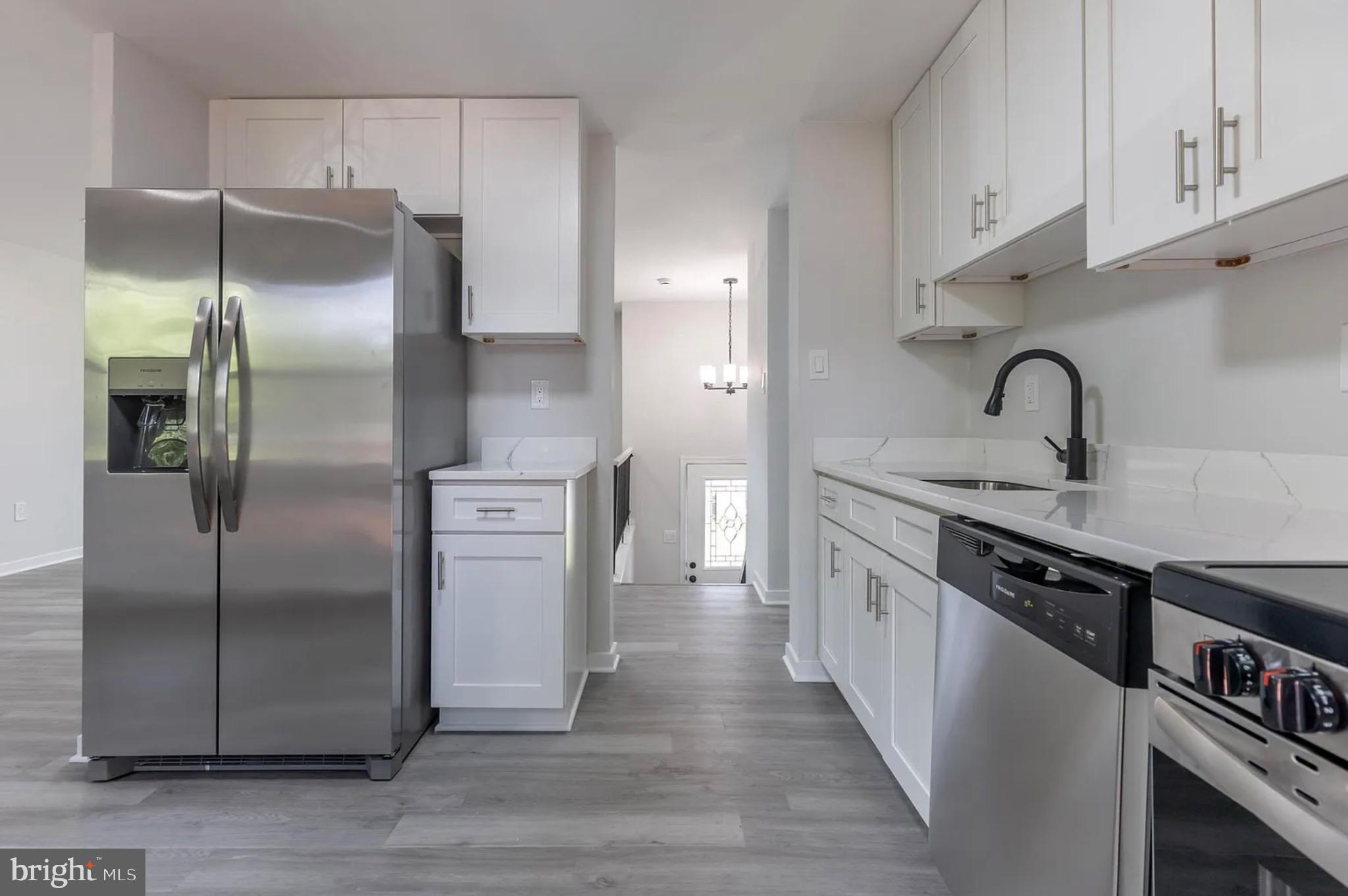 131 North Garfield Road Sterling, VA 20164 - Photo 10 of 13 Modern kitchen with sleek appliances.