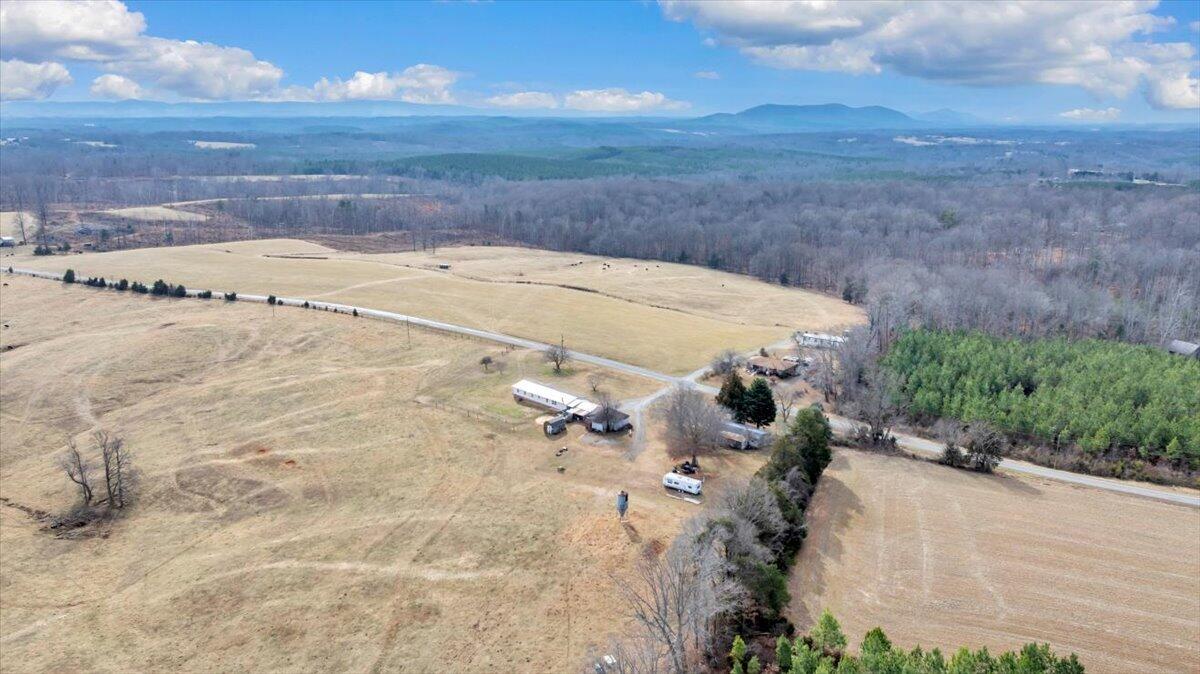 627-641 Novelty Road Penhook, VA 24137 - Photo 58 of 64 a view of a dry yard with wooden fence
