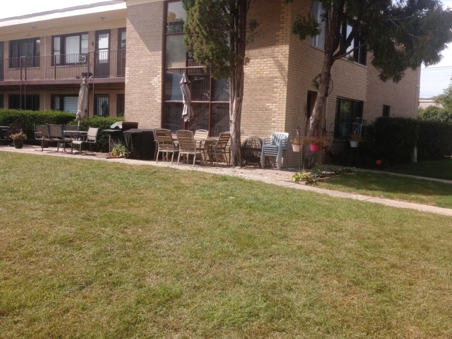 a view of swimming pool with outdoor seating