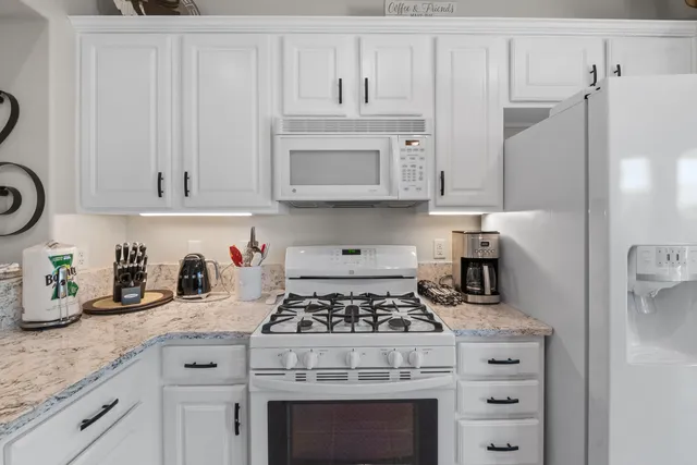 a workspace with furniture and window