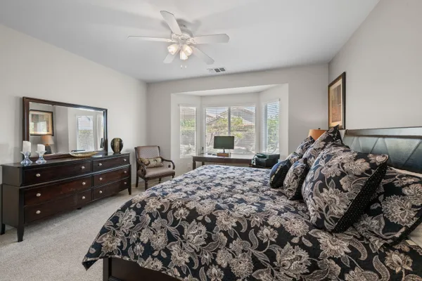 a workspace with furniture and window