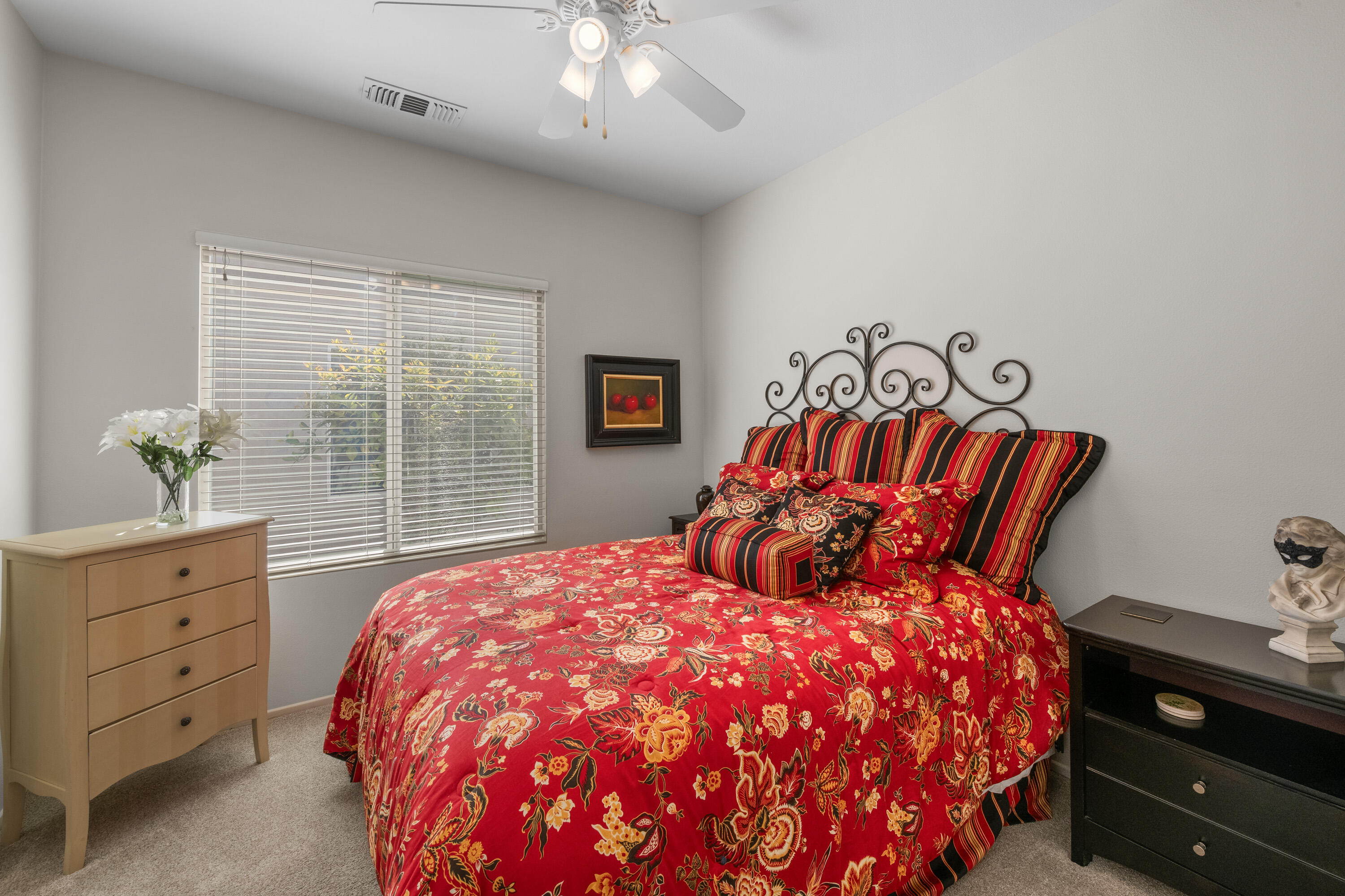 78680 Postbridge Circle Palm Desert, CA 92211 - Photo 20 of 54 a bedroom with a bed and window