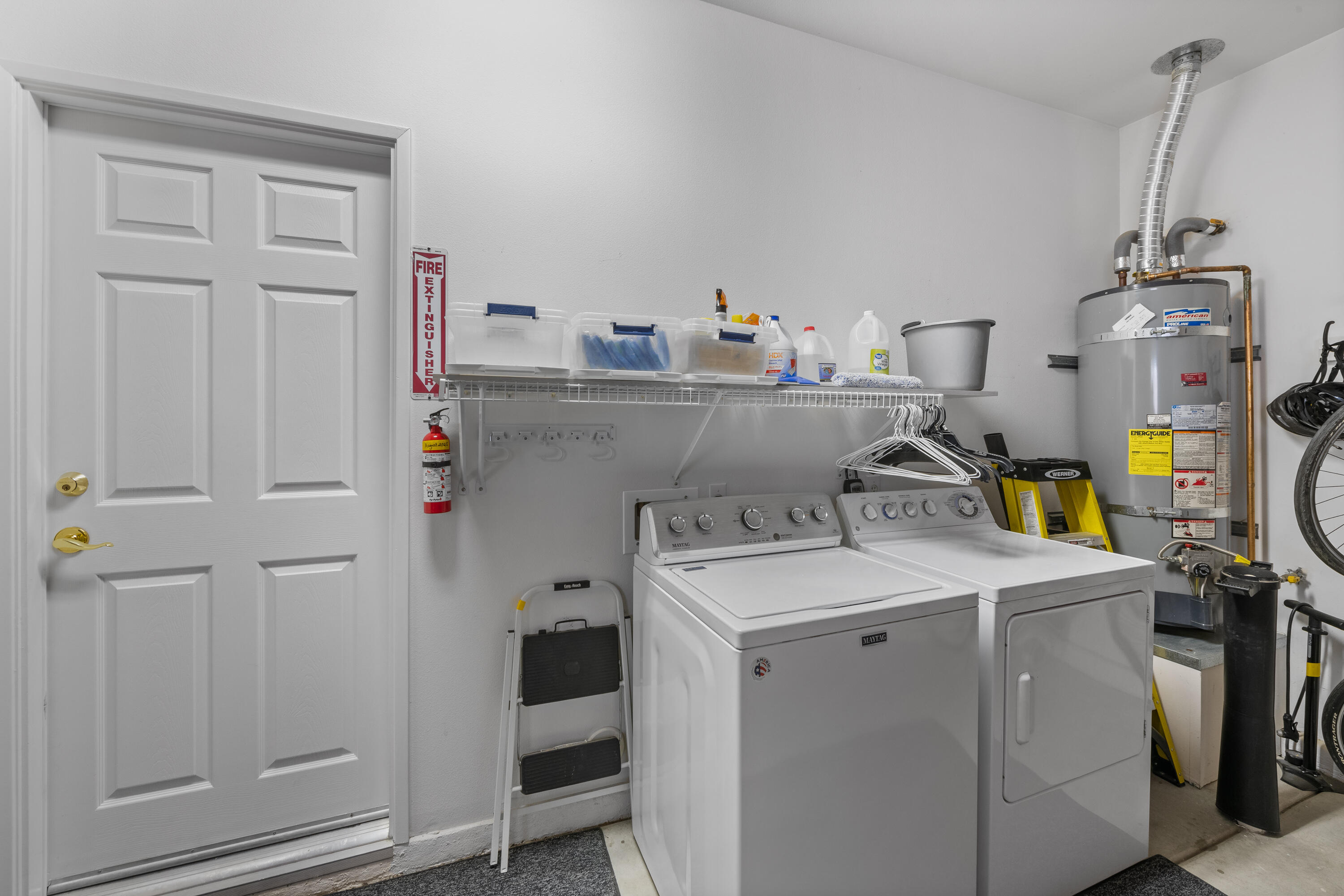 78680 Postbridge Circle Palm Desert, CA 92211 - Photo 22 of 54 a utility room with dryer and washer