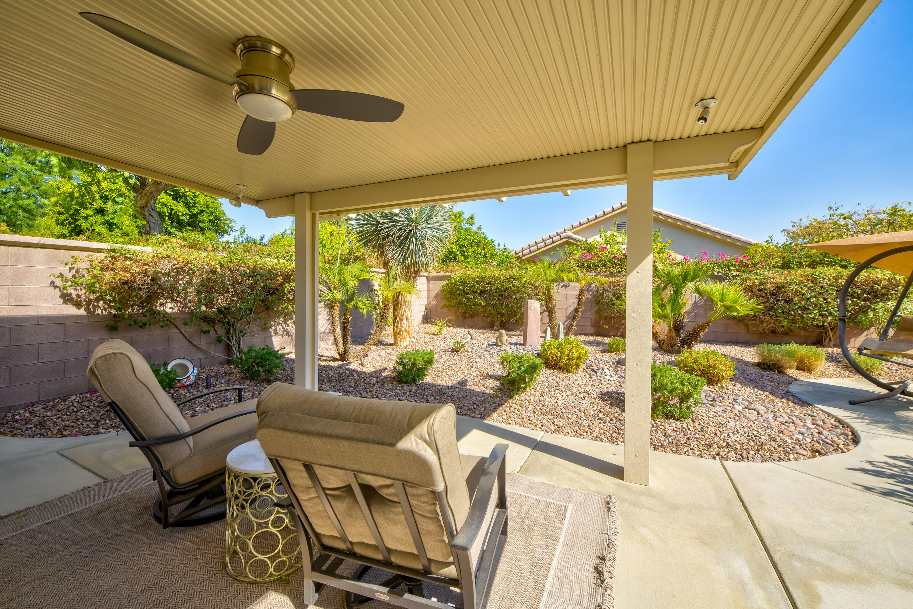 78680 Postbridge Circle Palm Desert, CA 92211 - Photo 7 of 54 a outdoor space with furniture