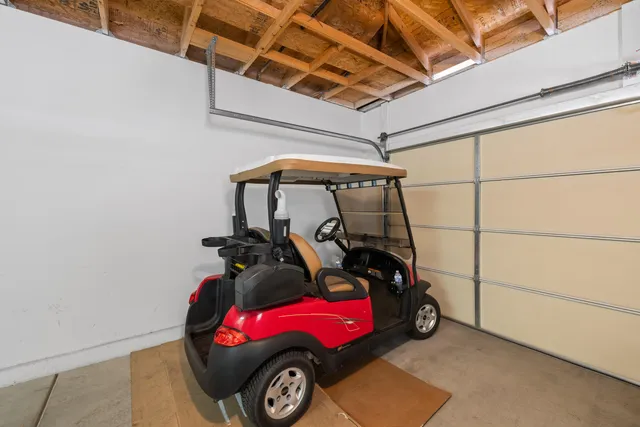 a view of kitchen with cabinets table and chairs