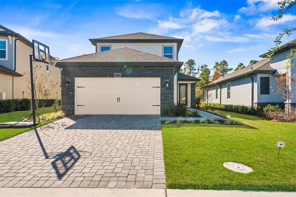 a front view of a house with swimming pool