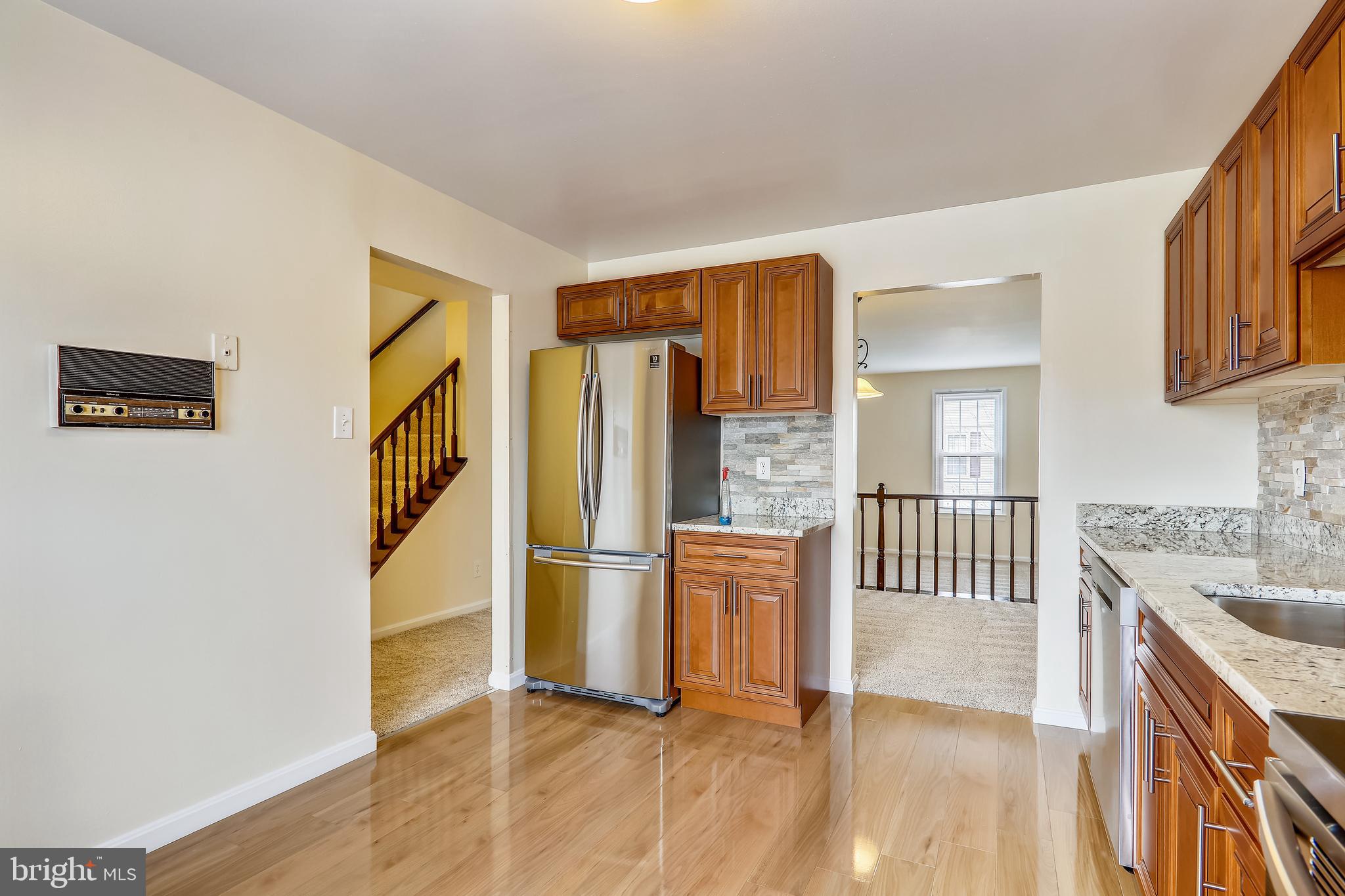 10600 Georgia Avenue Silver Spring, MD 20902 - Photo 3 of 44 Main level table-space kitchen