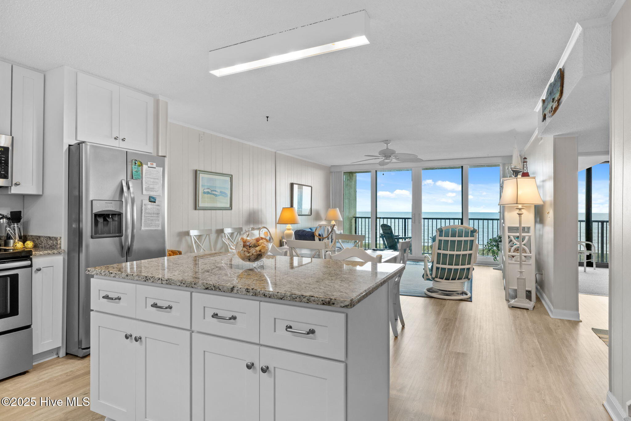 2305 West Fort Macon Road, Unit 308 Atlantic Beach, NC 28512 - Photo 28 of 33 kitchen thru to living
