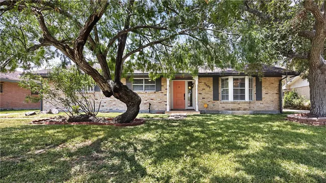 front view of house with a yard